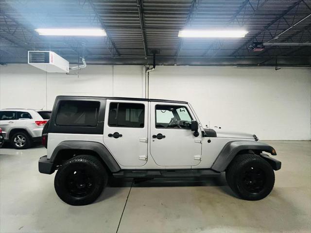 used 2011 Jeep Wrangler Unlimited car, priced at $12,900