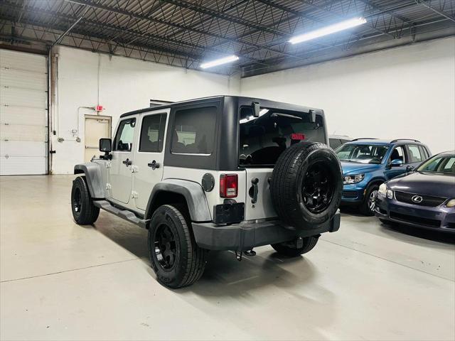 used 2011 Jeep Wrangler Unlimited car, priced at $12,900