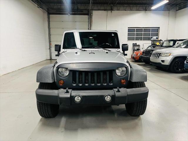 used 2011 Jeep Wrangler Unlimited car, priced at $12,900