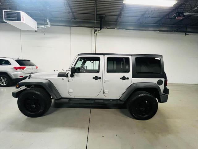 used 2011 Jeep Wrangler Unlimited car, priced at $12,900