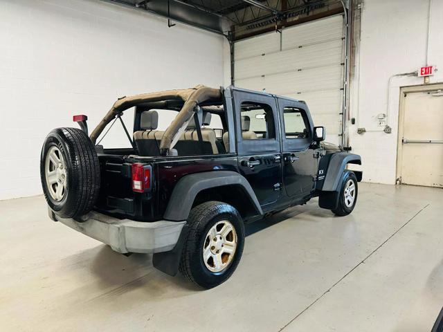 used 2009 Jeep Wrangler Unlimited car, priced at $10,500