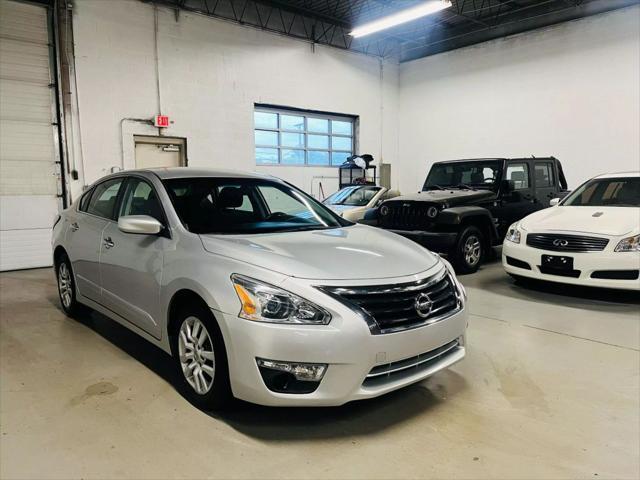 used 2015 Nissan Altima car, priced at $10,500