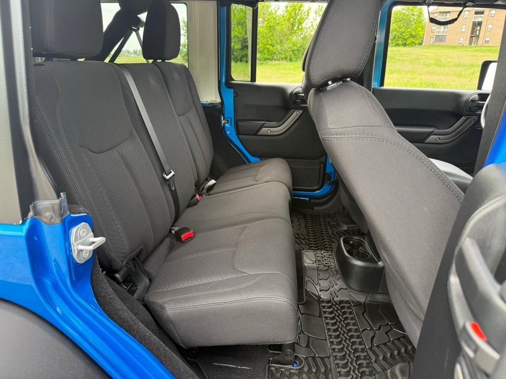 used 2015 Jeep Wrangler Unlimited car, priced at $20,729