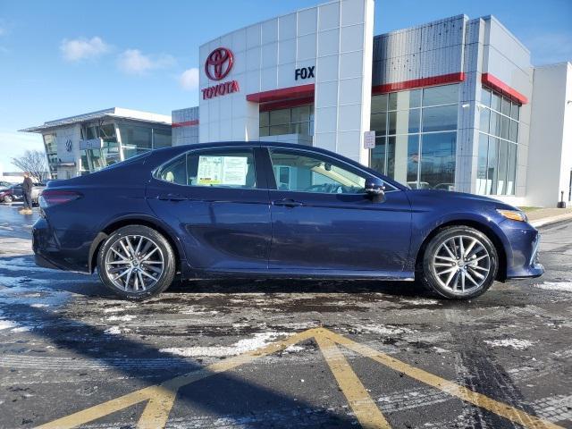 used 2022 Toyota Camry Hybrid car, priced at $27,994