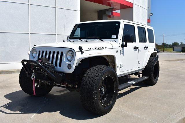 used 2015 Jeep Wrangler Unlimited car, priced at $23,223