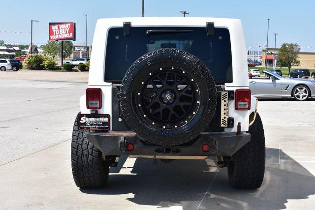 used 2015 Jeep Wrangler Unlimited car, priced at $23,223