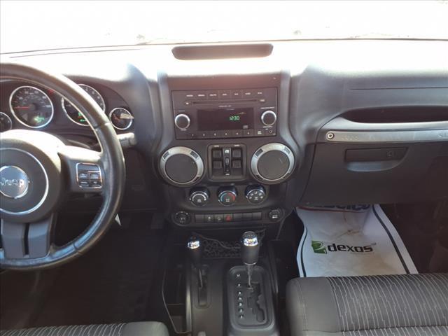 used 2011 Jeep Wrangler Unlimited car, priced at $13,990