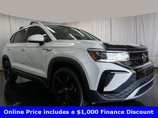 used 2023 Volkswagen Taos car, priced at $21,000