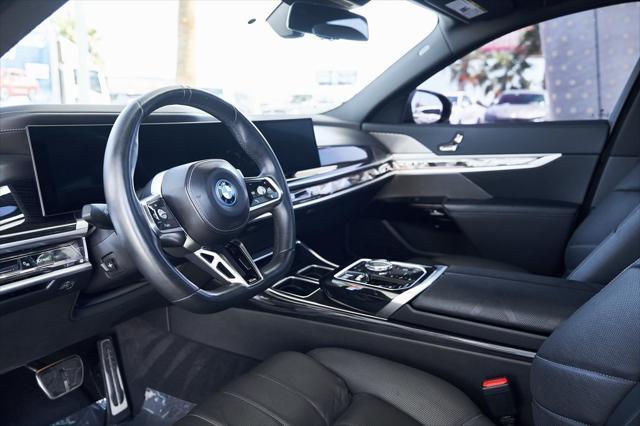 used 2024 BMW 750e car, priced at $80,800