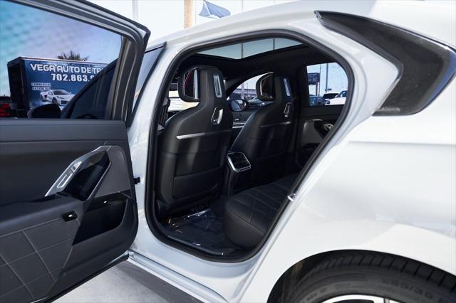 used 2024 BMW 750e car, priced at $80,800