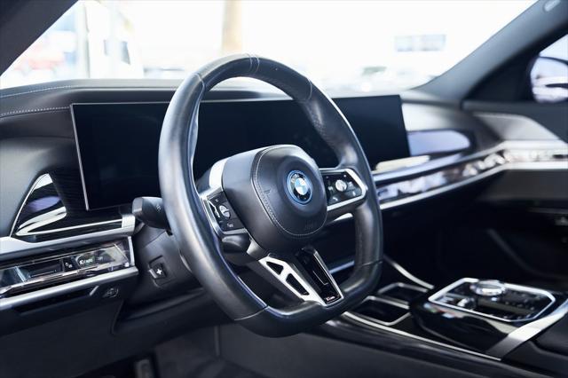 used 2024 BMW 750e car, priced at $80,800