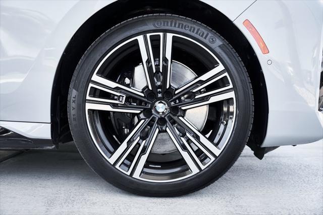 used 2024 BMW 750e car, priced at $80,800