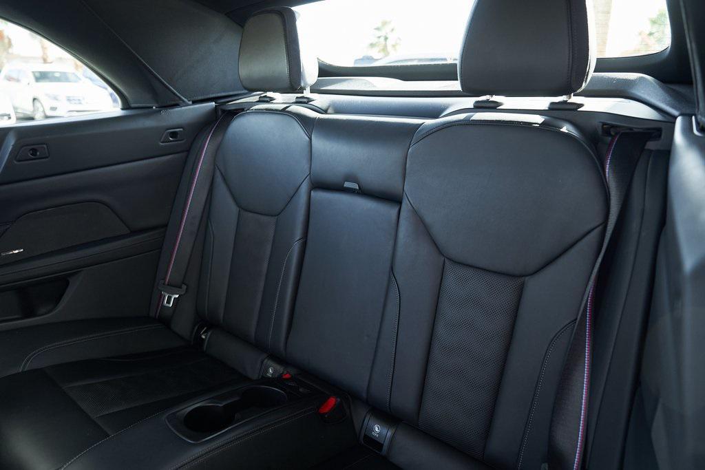 used 2023 BMW M4 car, priced at $70,800