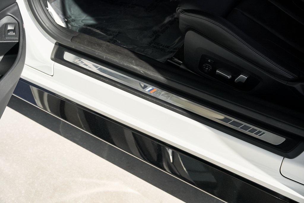 used 2023 BMW M4 car, priced at $70,800
