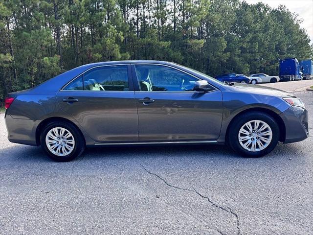 used 2013 Toyota Camry car, priced at $12,999