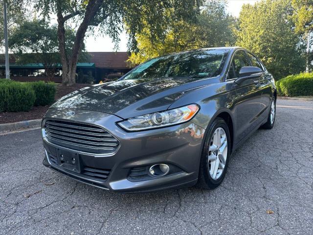 used 2016 Ford Fusion car, priced at $9,999