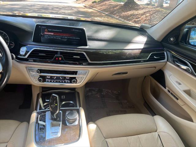 used 2016 BMW 750 car, priced at $27,999