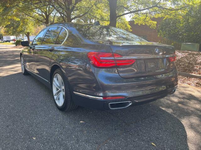 used 2016 BMW 750 car, priced at $27,999