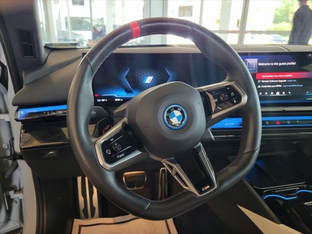used 2024 BMW i5 car, priced at $64,995