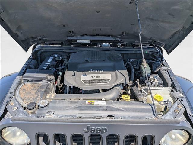 used 2014 Jeep Wrangler Unlimited car, priced at $17,297