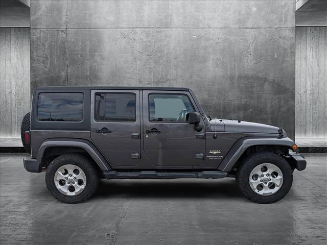 used 2014 Jeep Wrangler Unlimited car, priced at $16,495