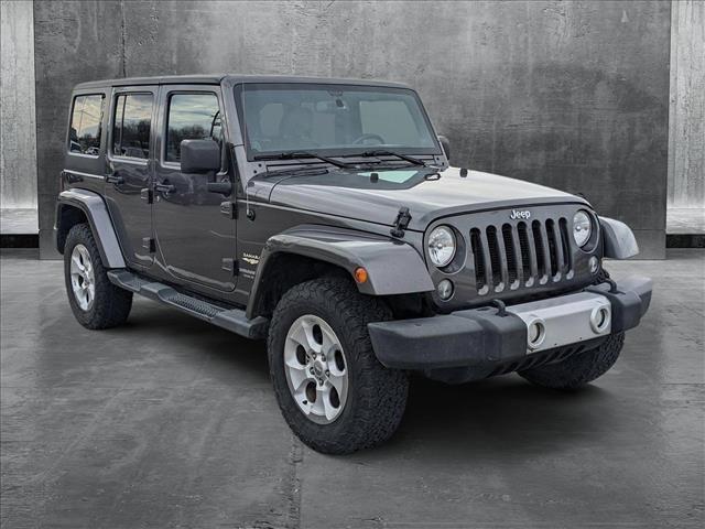 used 2014 Jeep Wrangler Unlimited car, priced at $16,495