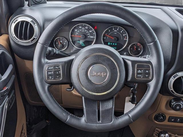 used 2014 Jeep Wrangler Unlimited car, priced at $16,495