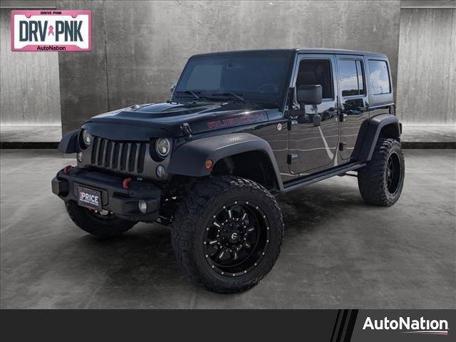 used 2014 Jeep Wrangler Unlimited car, priced at $19,495