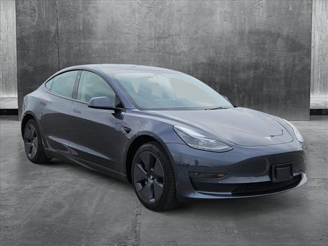 used 2023 Tesla Model 3 car, priced at $29,495