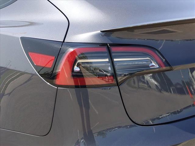 used 2023 Tesla Model 3 car, priced at $30,495