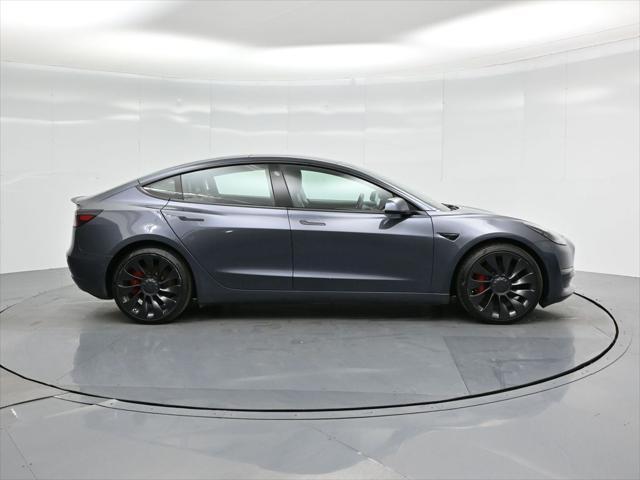 used 2022 Tesla Model 3 car, priced at $28,000