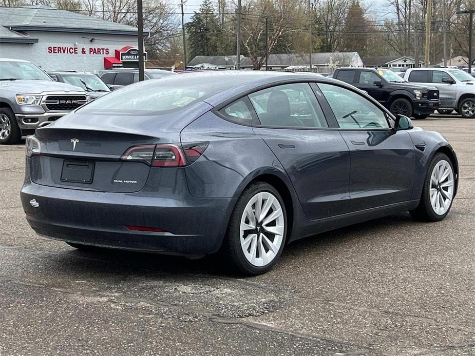 used 2022 Tesla Model 3 car, priced at $28,500