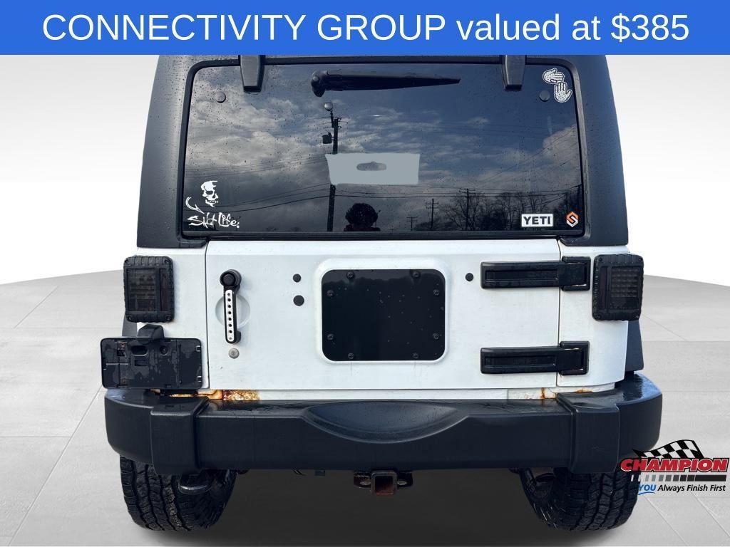 used 2012 Jeep Wrangler Unlimited car, priced at $12,125