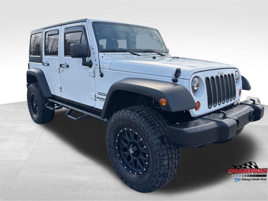 used 2012 Jeep Wrangler Unlimited car, priced at $12,125