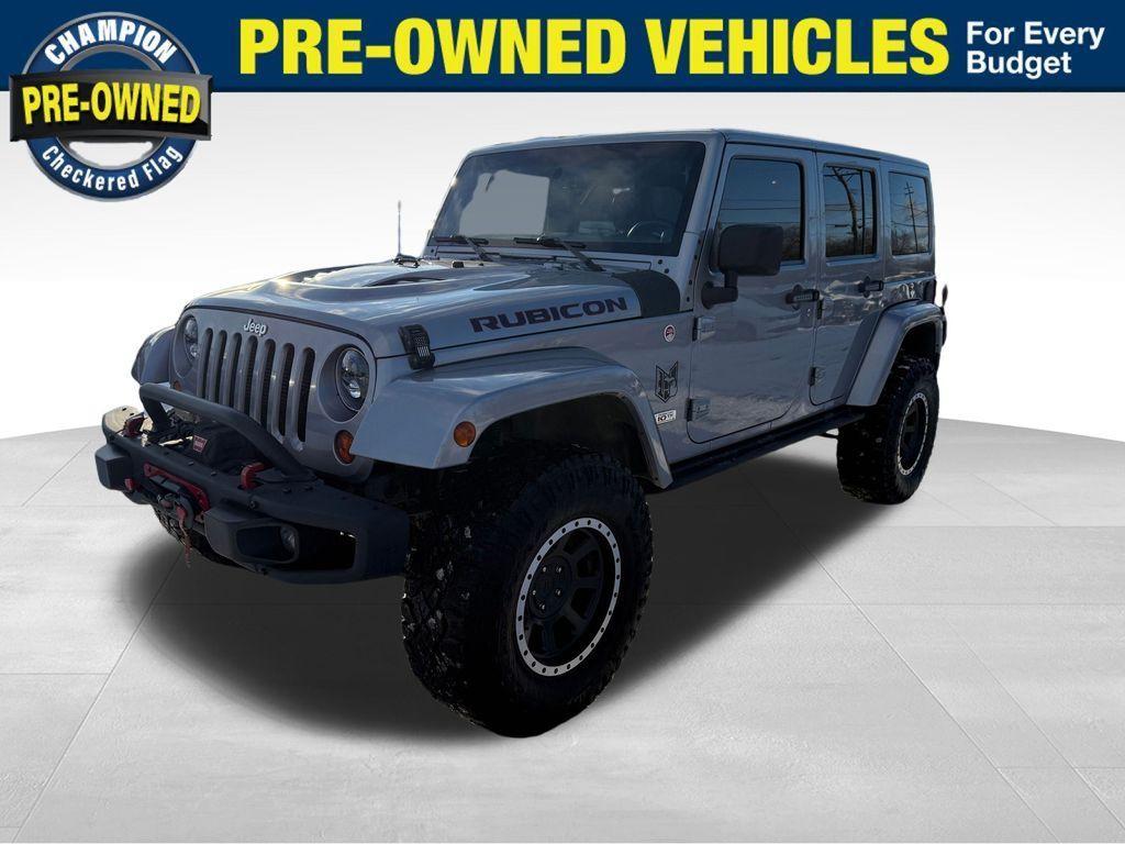 used 2013 Jeep Wrangler Unlimited car, priced at $17,900