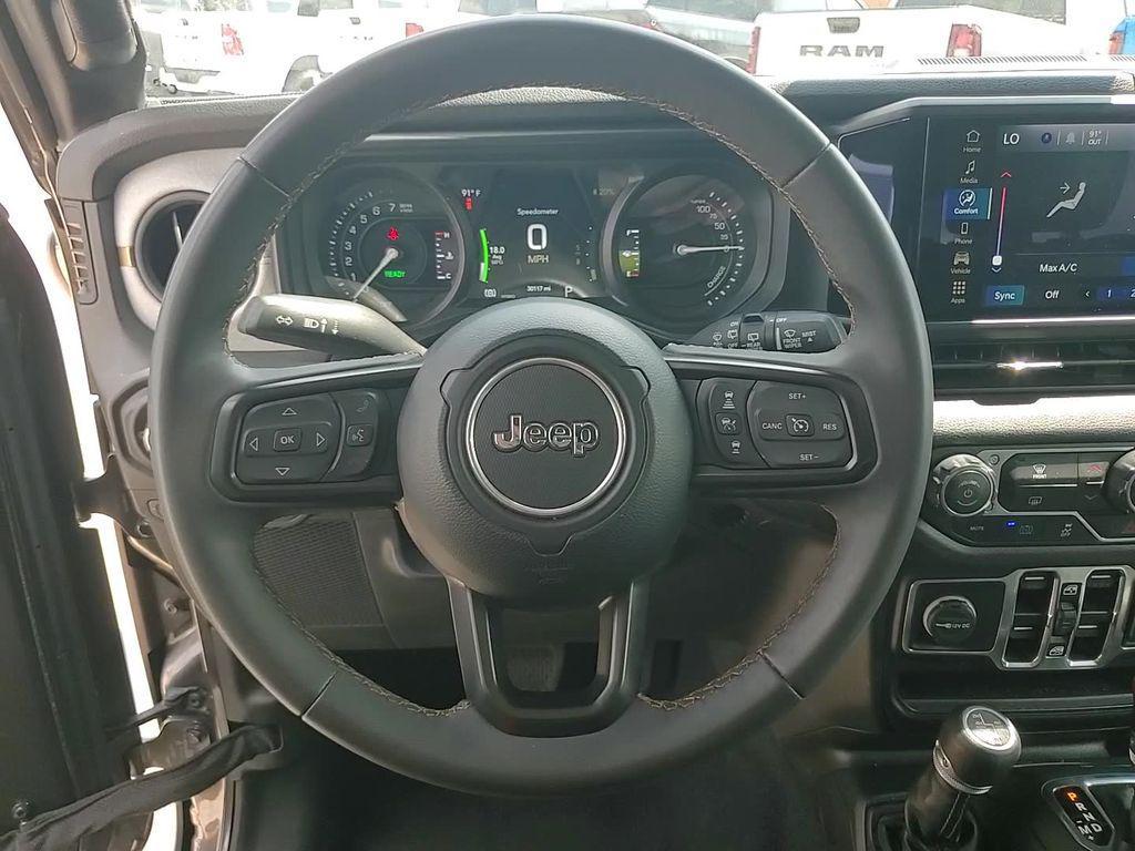 used 2024 Jeep Wrangler 4xe car, priced at $32,595