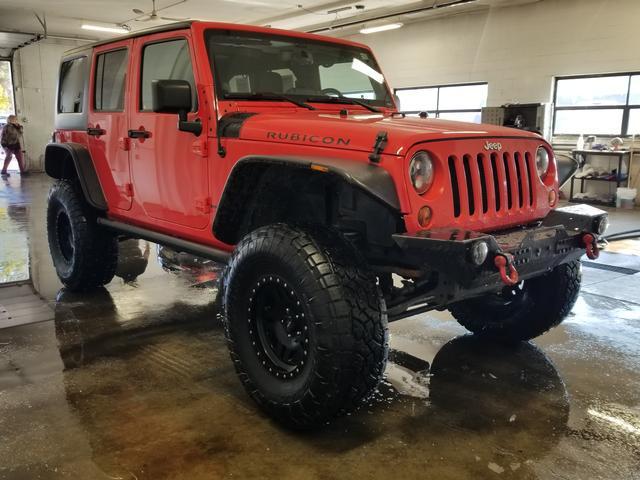 used 2013 Jeep Wrangler Unlimited car, priced at $15,394