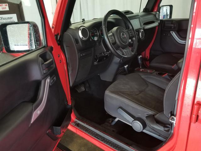 used 2013 Jeep Wrangler Unlimited car, priced at $15,394