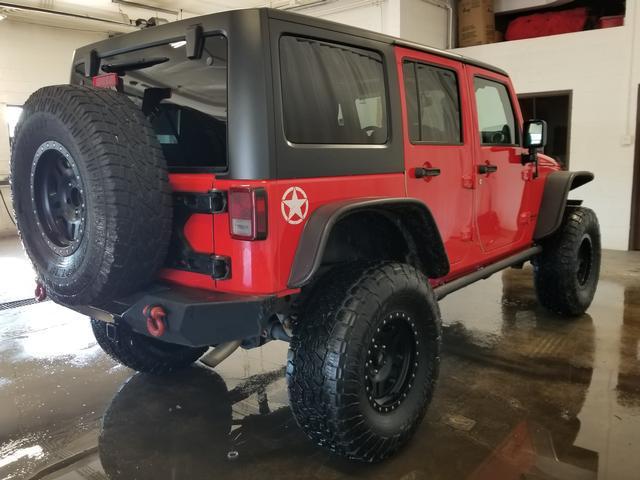 used 2013 Jeep Wrangler Unlimited car, priced at $15,394