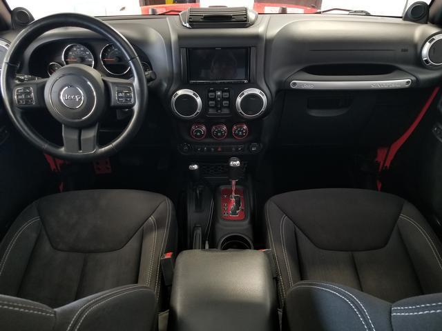 used 2013 Jeep Wrangler Unlimited car, priced at $15,394