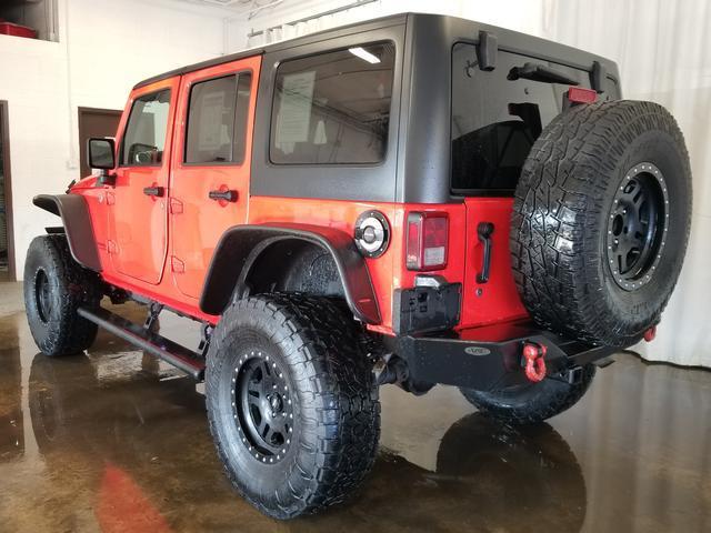 used 2013 Jeep Wrangler Unlimited car, priced at $15,394