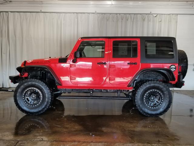 used 2013 Jeep Wrangler Unlimited car, priced at $15,394