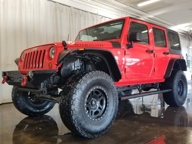 used 2013 Jeep Wrangler Unlimited car, priced at $16,595