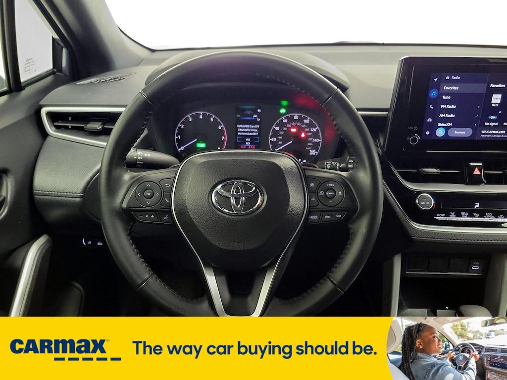 used 2024 Toyota Corolla Cross Hybrid car, priced at $31,998