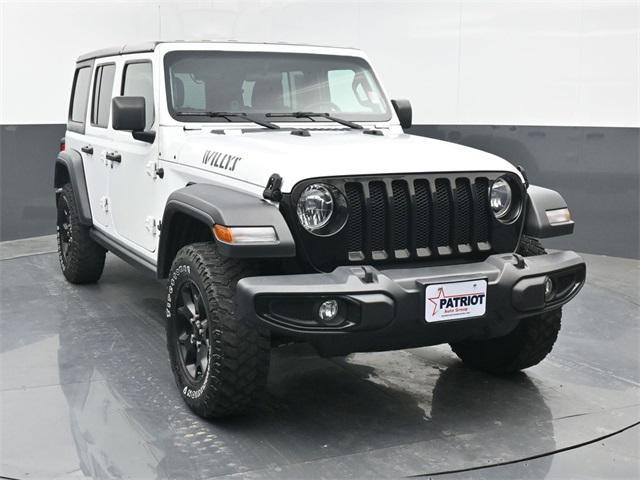 used 2021 Jeep Wrangler Unlimited car, priced at $30,000