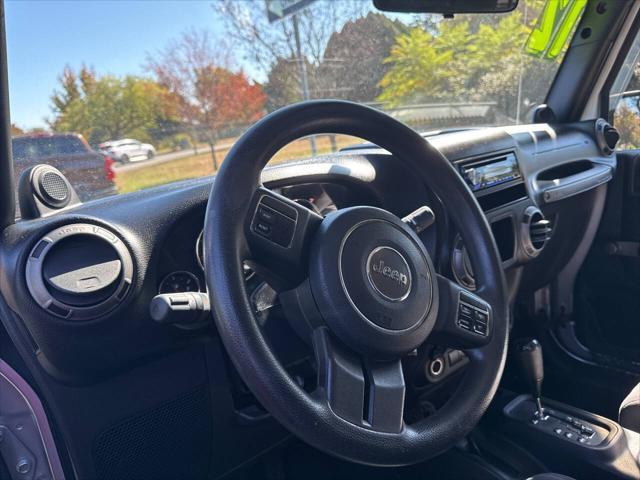 used 2012 Jeep Wrangler Unlimited car, priced at $14,591