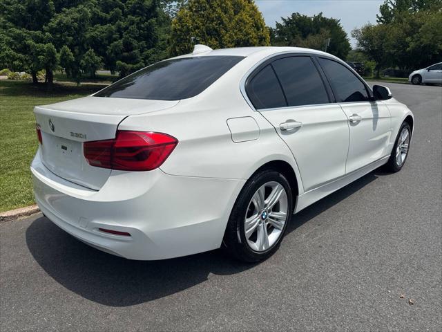 used 2018 BMW 330 car, priced at $13,491