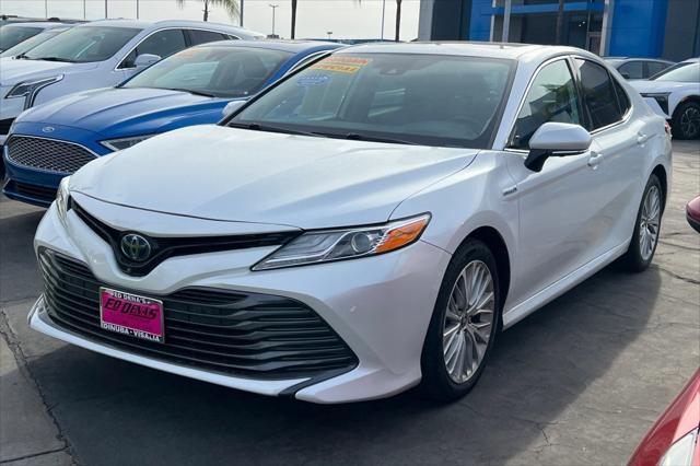 used 2020 Toyota Camry Hybrid car, priced at $28,736