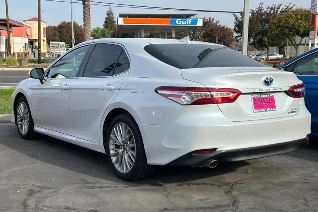 used 2020 Toyota Camry Hybrid car, priced at $28,736