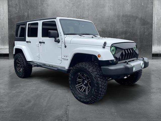 used 2018 Jeep Wrangler JK Unlimited car, priced at $25,888